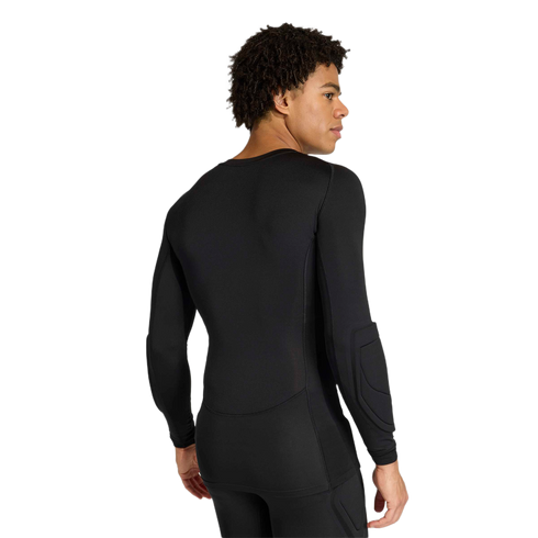 Rear view of a man wearing a black long-sleeved athletic compression shirt with elbow padding and matching black leggings.