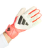 White and coral Adidas Predator goalkeeper glove on a hand, featuring dark grey stripes and a textured backhand, set against a solid black background.