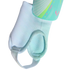 Light blue shin guard sleeve with ankle padding and a foot strap. A teal Messi-branded shin guard is partially visible at the top against a black background.