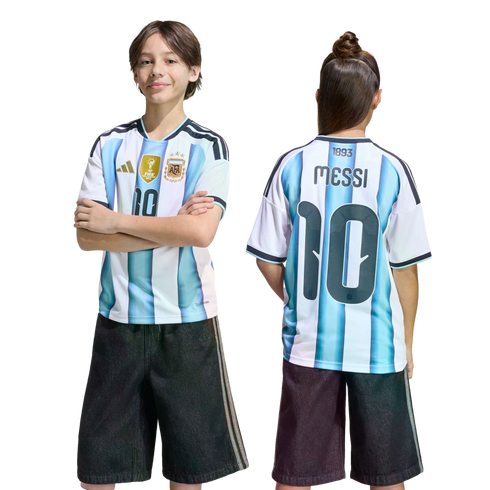Front and back view of a child wearing an Argentina soccer jersey with "Messi 10" and dark shorts against a solid black background.