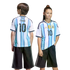 Front and back views of two children wearing Argentina football jerseys with "MESSI 10" and dark shorts, set against a solid black background.