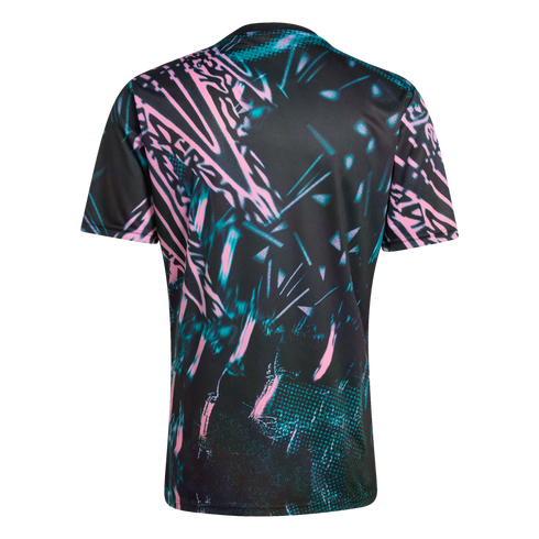 Back of a black t-shirt with a bold abstract print featuring sharp lines and halftone dots in neon pink and teal.