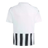 Back view of a white jersey featuring black shoulder stripes and a black and white vertical striped panel at the bottom.