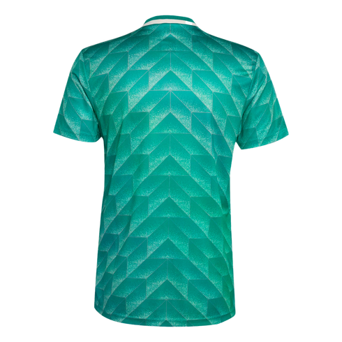 Back of a green short-sleeved jersey with a geometric pattern of faceted triangles in various shades of green and white collar trim.