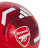 Close-up of a red Adidas soccer ball featuring the Arsenal Football Club crest.