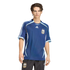 A man wearing a dark blue Adidas Argentina national team soccer jersey and black shorts against a solid black background.