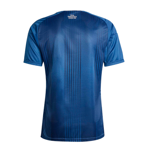 Back view of a blue athletic jersey featuring tonal vertical stripes and white Greek text at the upper neck, set against a solid black background.