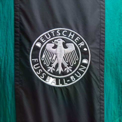 Embroidered Deutscher Fußball-Bund (DFB) crest with a white eagle on black and green fabric.