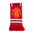 Red Manchester United knitted scarf with the club's crest in yellow and red, horizontal white and black stripes, and red fringe at the bottom.