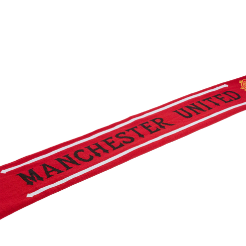 Manchester United red knit scarf with black text and white borders.