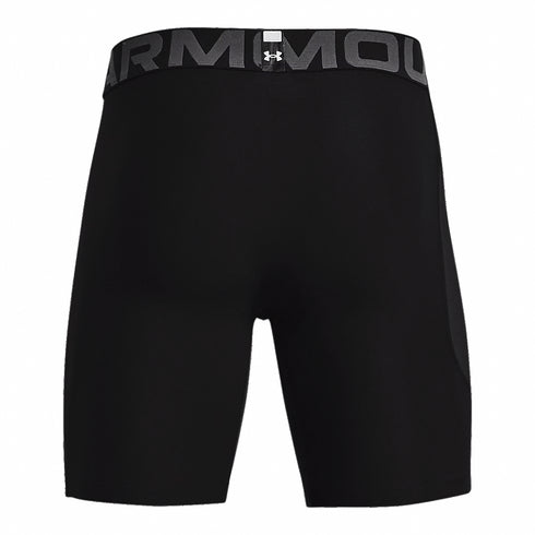 Rear view of black Under Armour compression shorts featuring a branded elastic waistband with the UA logo.