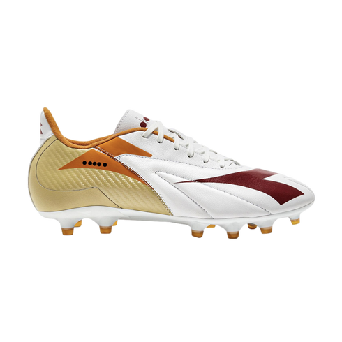 Side profile of a white Diadora soccer cleat featuring gold heel panels and maroon logo graphics on a white background.