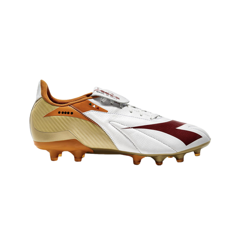 Diadora soccer cleat with a white leather upper, gold heel, burgundy logo, and orange studs. Features a fold-over tongue with "MADE IN ITALY" text.