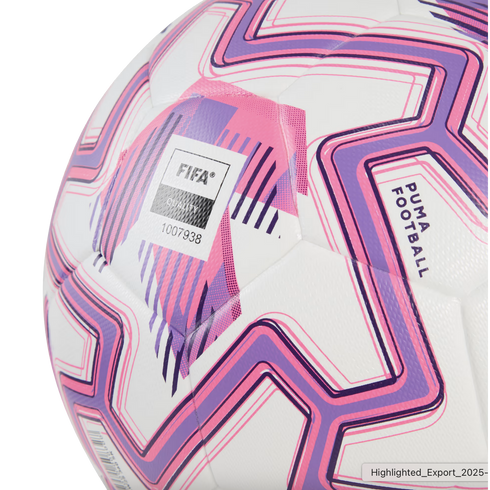 Close-up of a white Puma football featuring pink and purple zigzag patterns and a "FIFA Quality" certification mark.