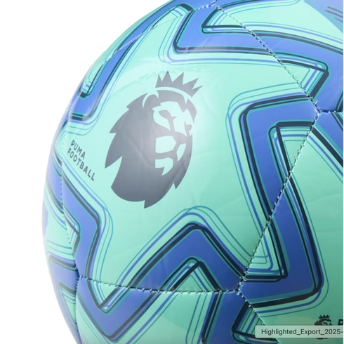Close-up of a teal and blue Puma soccer ball with angular patterns and the Premier League lion logo in dark grey.