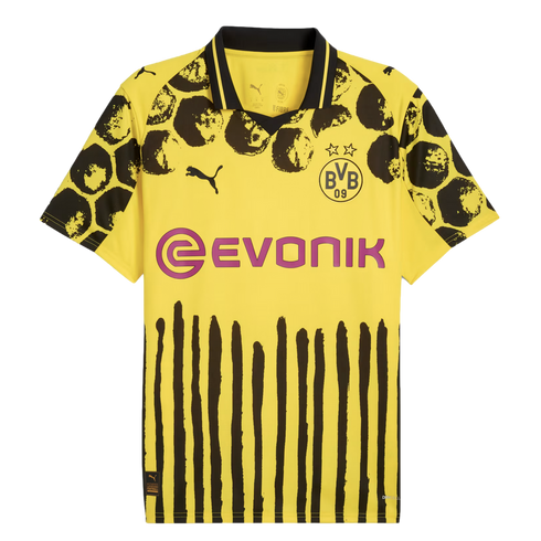 Yellow Puma Borussia Dortmund jersey with black circular shoulder graphics, vertical brush-stroke stripes on the lower half, and a purple "Evonik" sponsor logo.