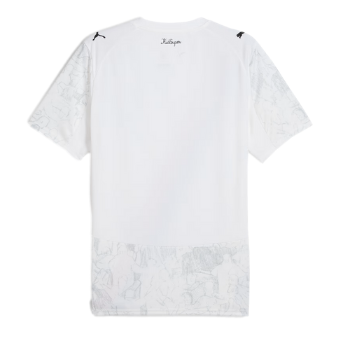 Back view of a white short-sleeved jersey with Puma logos on the shoulders, cursive "KidSuper" text, and light gray sketch-style patterns on the sleeves and lower hem.
