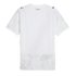 Back view of a white short-sleeved jersey with Puma logos on the shoulders, cursive "KidSuper" text, and light gray sketch-style patterns on the sleeves and lower hem.