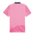 Back view of a pink short-sleeved jersey with a dark blue collar, vertical stripes on sleeves, "KidSuper" text, and a marbled pink pattern at the bottom hem.