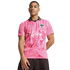 A man wears a pink Puma soccer jersey featuring a black collar, "codere" logo, and a marbled graphic pattern against a plain white background.