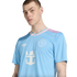 Man wearing a light blue Inter Miami CF third jersey with pink and white trim and Royal Caribbean sponsor logo.