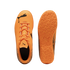 Top and sole views of an orange Puma indoor soccer shoe with black logos on a black background.