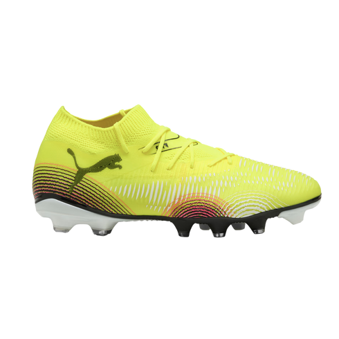 Neon yellow Puma soccer cleat with black and pink graphic patterns on the side and a white-studded soleplate.