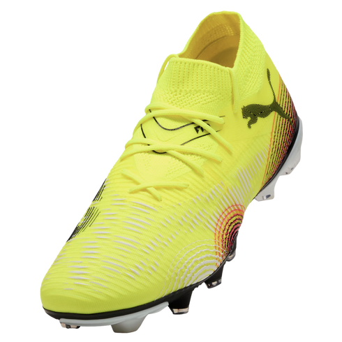 A neon yellow Puma soccer cleat with black and orange patterns and a textured upper, shown at an angle against a black background.