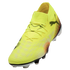 A neon yellow Puma soccer cleat with black and orange patterns and a textured upper, shown at an angle against a black background.