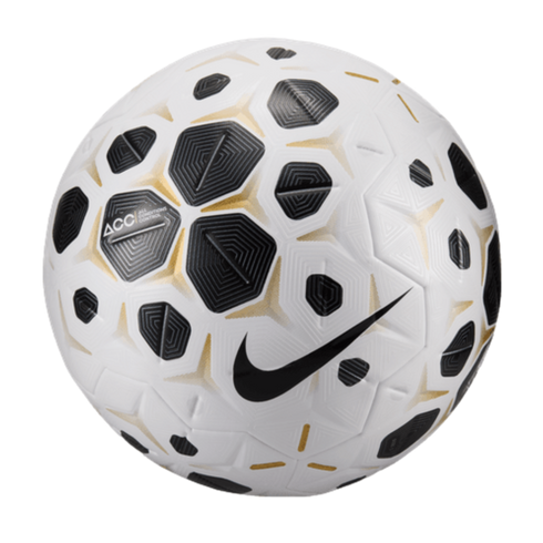 White Nike soccer ball featuring black geometric patterns with gold accents and a black swoosh logo, isolated on a black background.
