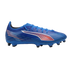 A royal blue Puma soccer cleat with white and orange accents, shown from the side against a black background.