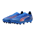 Pair of blue Puma soccer cleats with orange and white accents and molded studs on a black background.