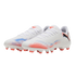 White Puma soccer cleats with red and blue spray-paint patterns on the sides, white laces, and red-tipped studs, shown against a solid black background.