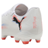 A white Puma Future soccer cleat shown from a rear angle, featuring a black cat logo with red and blue graphic accents, orange studs, and "PLAY FREE FUTURE" text on the heel.