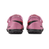 Rear view of pink Nike Mercurial turf soccer shoes with black soles, isolated on a black background.