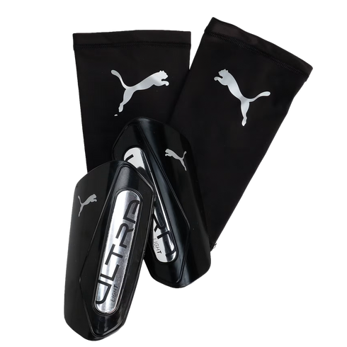 Black Puma Ultra Light shin guards and matching black compression sleeves featuring silver Puma logos.