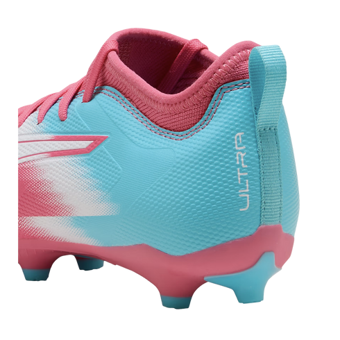 Side and rear view of a cyan and pink soccer cleat featuring a textured upper, pink collar, and the word "ULTRA" on the heel.