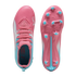 A top-down and bottom-up view of a pink and light blue Puma soccer cleat with light blue studs against a black background.
