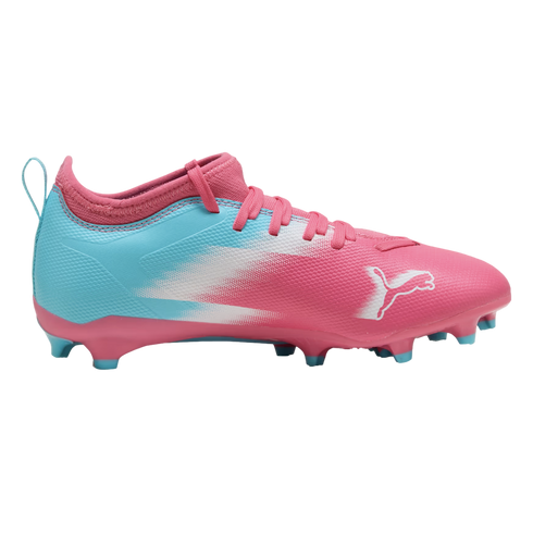 Side profile of a pink and light blue Puma soccer cleat with a brushstroke-like color transition and a white logo, set against a solid black background.