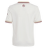 Back view of an off-white sports jersey with burgundy and gold striped cuffs and collar. A small burgundy crest is centered on the upper back.