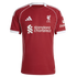A red Liverpool FC football jersey by Adidas featuring white piping, the club's Liver Bird crest, and the Standard Chartered sponsor logo in white.