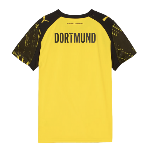 Back of a yellow Borussia Dortmund soccer jersey with black patterned sleeves and "DORTMUND" printed in bold black text.