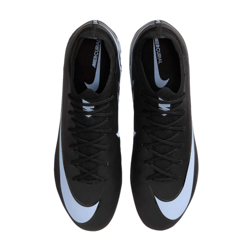 Top-down view of a pair of black Nike Mercurial soccer cleats with large white swooshes against a black background.
