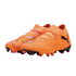 Bright orange Puma soccer cleats with pink and black accents, featuring a textured upper and knitted collar, isolated on a black background.