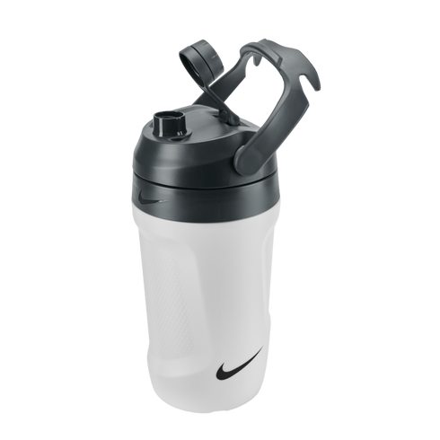 White Nike water bottle with a black flip-top lid, integrated handle, and swoosh logos, shown against a solid black background.