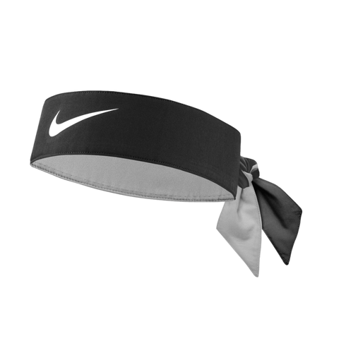 Black Nike tie-back headband with a black swoosh logo and light grey lining. It features two pointed tails at the back, one black and one light grey.
