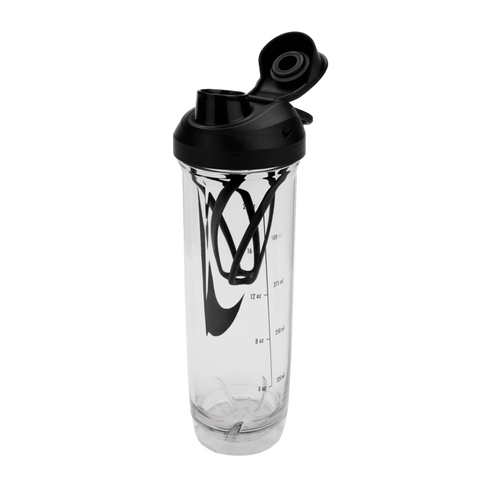 Clear Nike shaker bottle with a black flip-top lid, measurement markings, and a black internal mixing whisk, isolated against a black background.