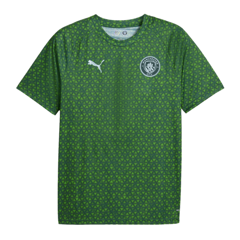 Green Manchester City FC short-sleeved training jersey featuring an all-over geometric pattern, a white Puma logo, and the club's crest.