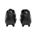 A rear view of black Diadora soccer cleats against a black background, with the white brand logo visible on each heel.