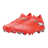 A pair of vibrant orange Puma soccer boots with silver logo accents and textured uppers, shown from a three-quarter view against a black background.